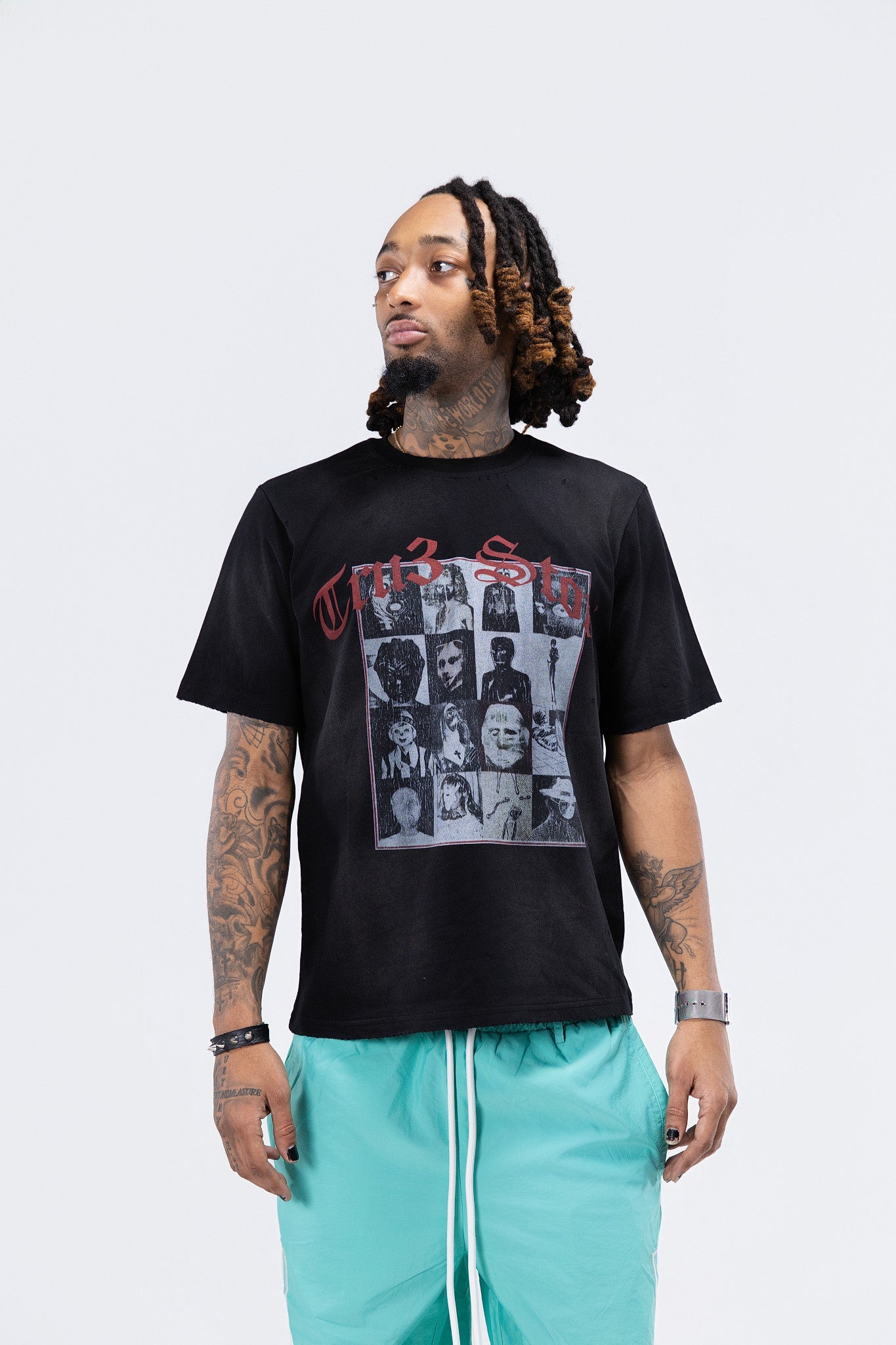 Many Faces Black Tee